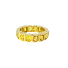 18K Yellow Gold Natural 4.20 Carat Yellow Sapphire Emerald Cut Eternity Ring