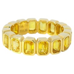 18K Yellow Gold Natural 4.20 Carat Yellow Sapphire Emerald Cut Eternity Ring