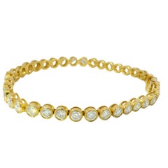 18k Yellow Gold Natural 6.58 Carat Graduated Diamond Bezel Set Tennis Bracelet