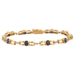 18K Yellow Gold Natural Blue Sapphire Bracelet with Round Diamonds
