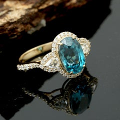 18K Yellow Gold Natural Blue Zircon & Diamond Halo Cocktail Ring