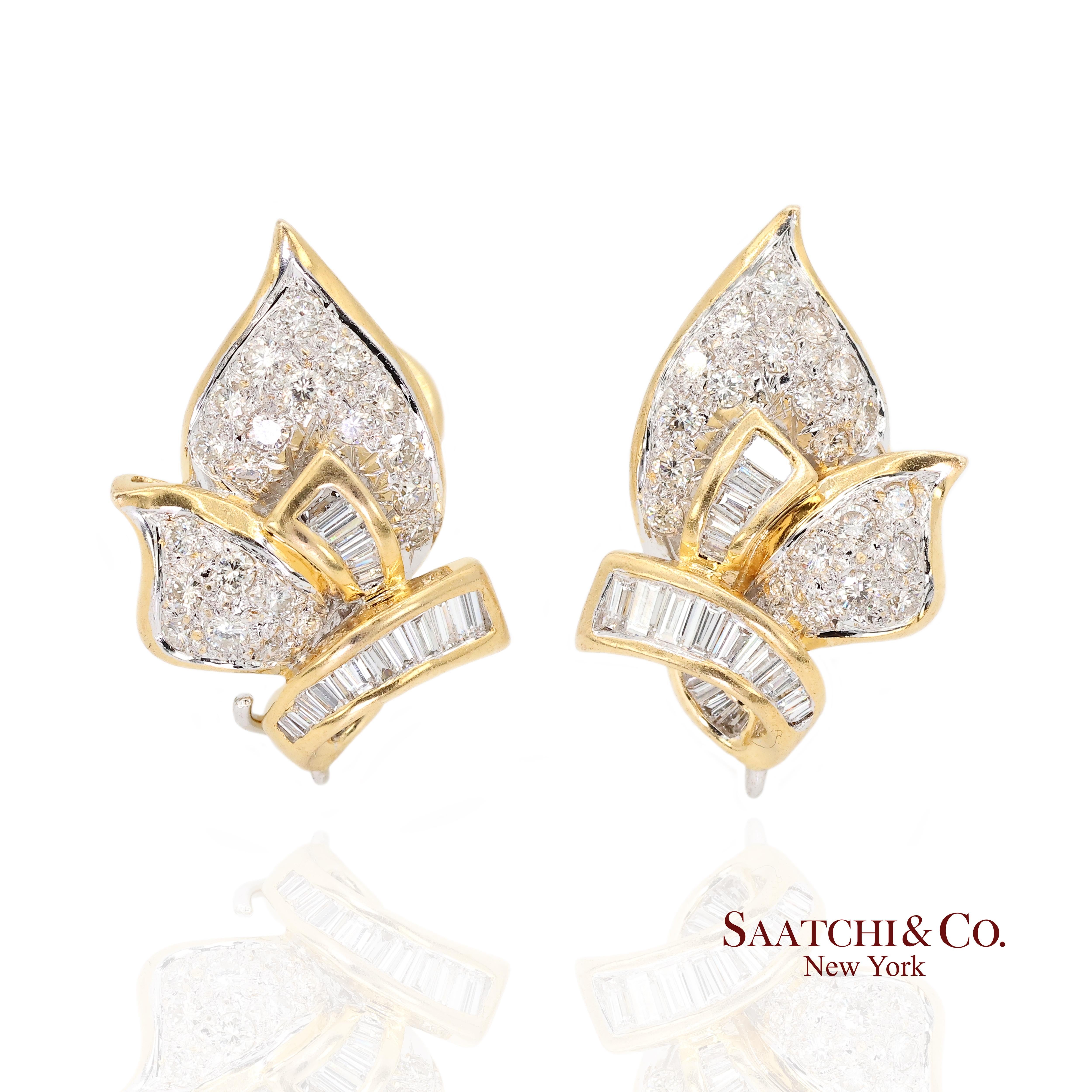 18k Yellow Gold Diamond Earring
Metal Type: 18k Yellow Gold
Total Item Weight: 10.7 Grams
Length: 25.0 mm
Width: 18.0 mm
Height: 15.0 mm
Sizable: No
1:
Natural Diamond Weight: 2.5 Ct. (70 Pcs)
Diamond Clarity Grade: VS1
Diamond Color Grade: