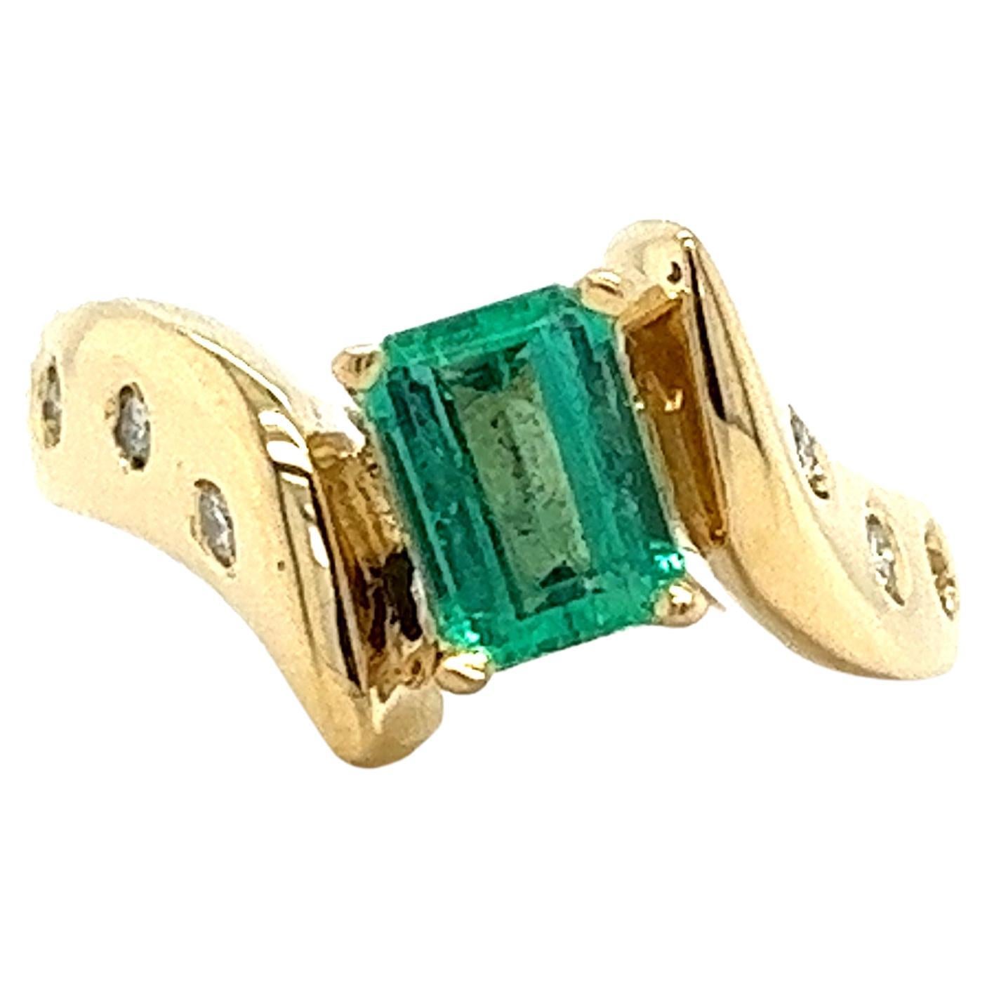 18k Yellow Gold Natural Emerald and Floating Diamond Bypass Statement Ring For Sale