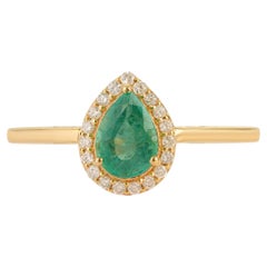 Bague de fiançailles en or jaune 18 carats, avec une émeraude naturelle taille poire et un halo de diamants