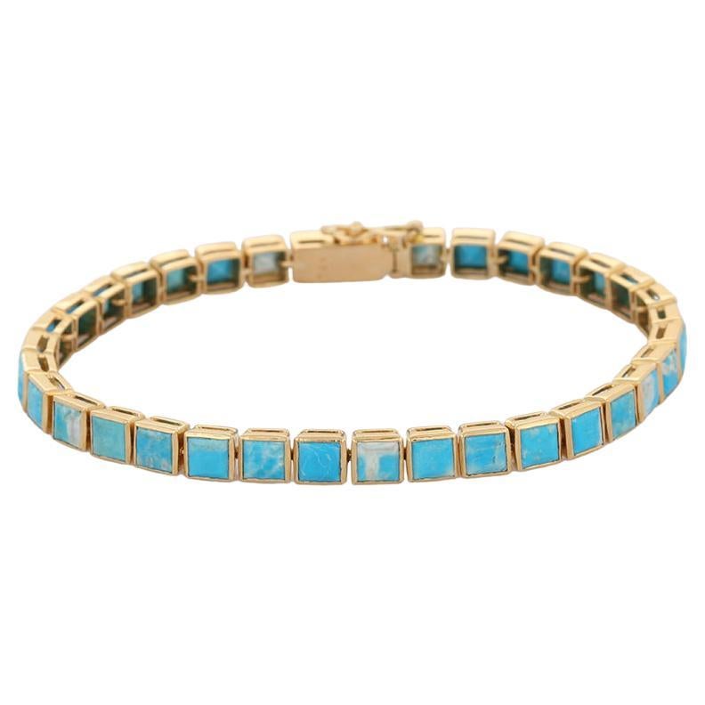 This Turquoise Tennis Bracelet Tennis Bracelet in 18K gold showcases 35 endlessly sparkling natural turquoise, weighing 10.15 carat. It measures 7.5 inches long in length. 
Turquoise enhances communication and expression. 
Designed with perfect