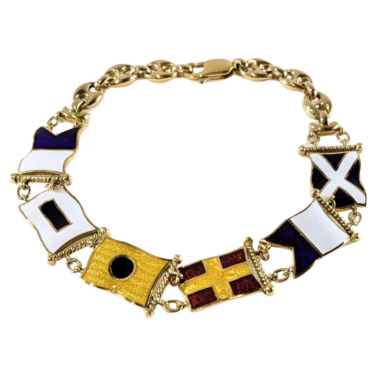Bracciale con bandiera nautica in oro giallo 18 carati con smalto inciso a fuoco