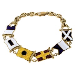 Bracelet drapeau nautique en or jaune 18 carats avec émail gravé au feu