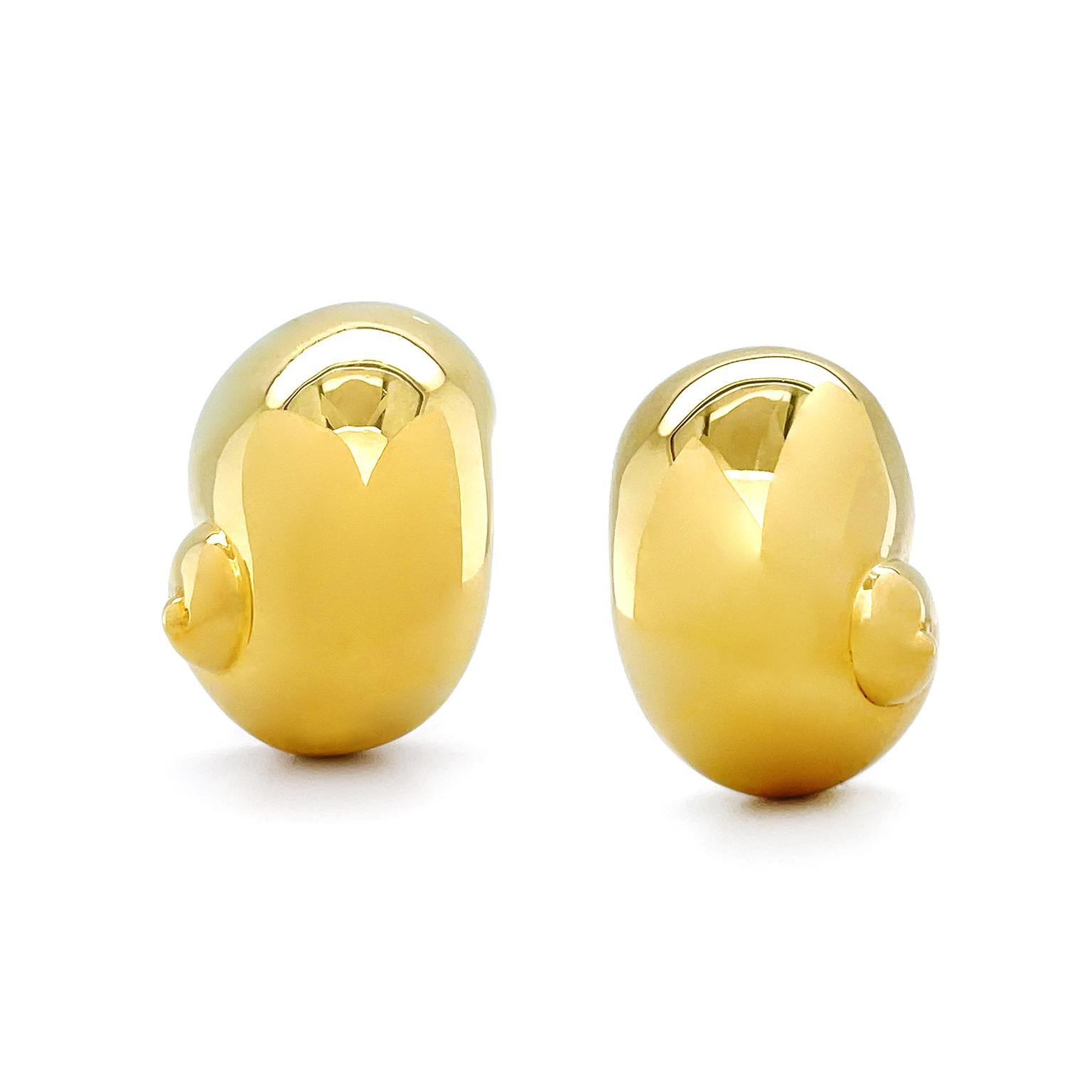 Inspired by the outline of the oceanic animal, Nautilus, these earrings feature distinct curves. 18k yellow gold sweeps upward before winding into a small curl. The polished metal allows for a warm luminosity to emit in every direction. Clip-backs