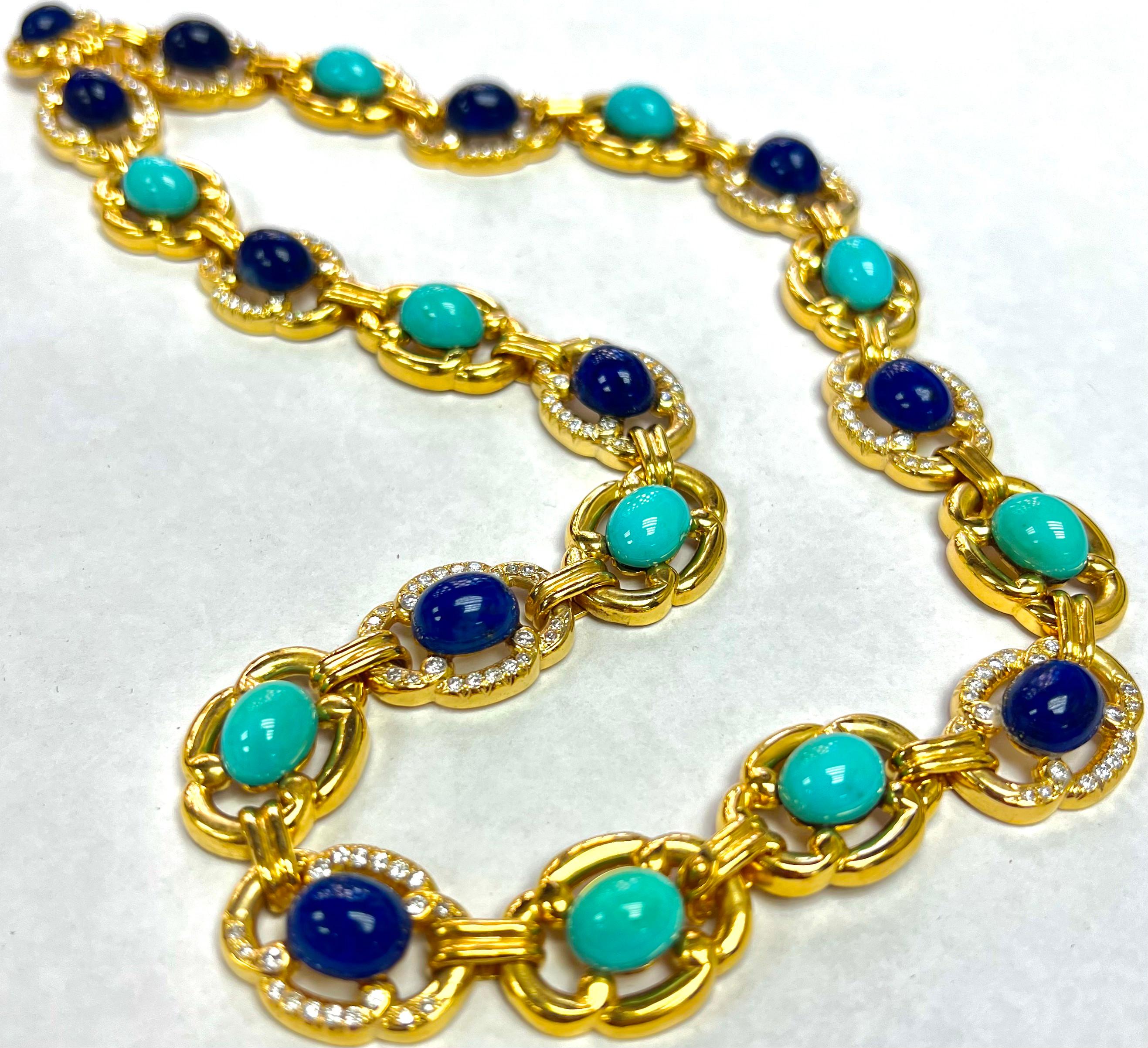 Showcasing a simply beautiful, elegant, and finely detailed yellow gold necklace/brooch, it features 11 perfectly set Lapis stones. Also it has 10 Turquoise Stones with a total carat weight of 43.08. Lastly it has 234 round diamonds, 5.68 total