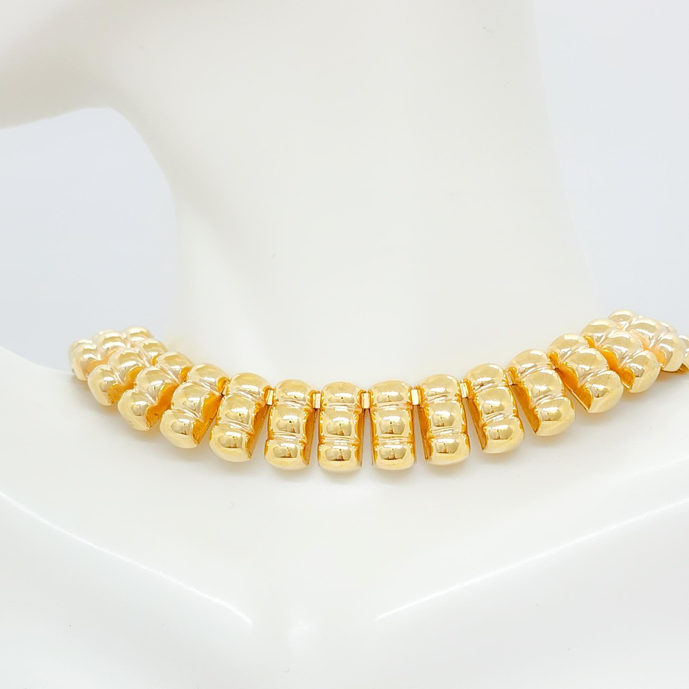 Beautiful necklace with a nice bead type design handmade in 18k yellow gold.  Length is 14.5