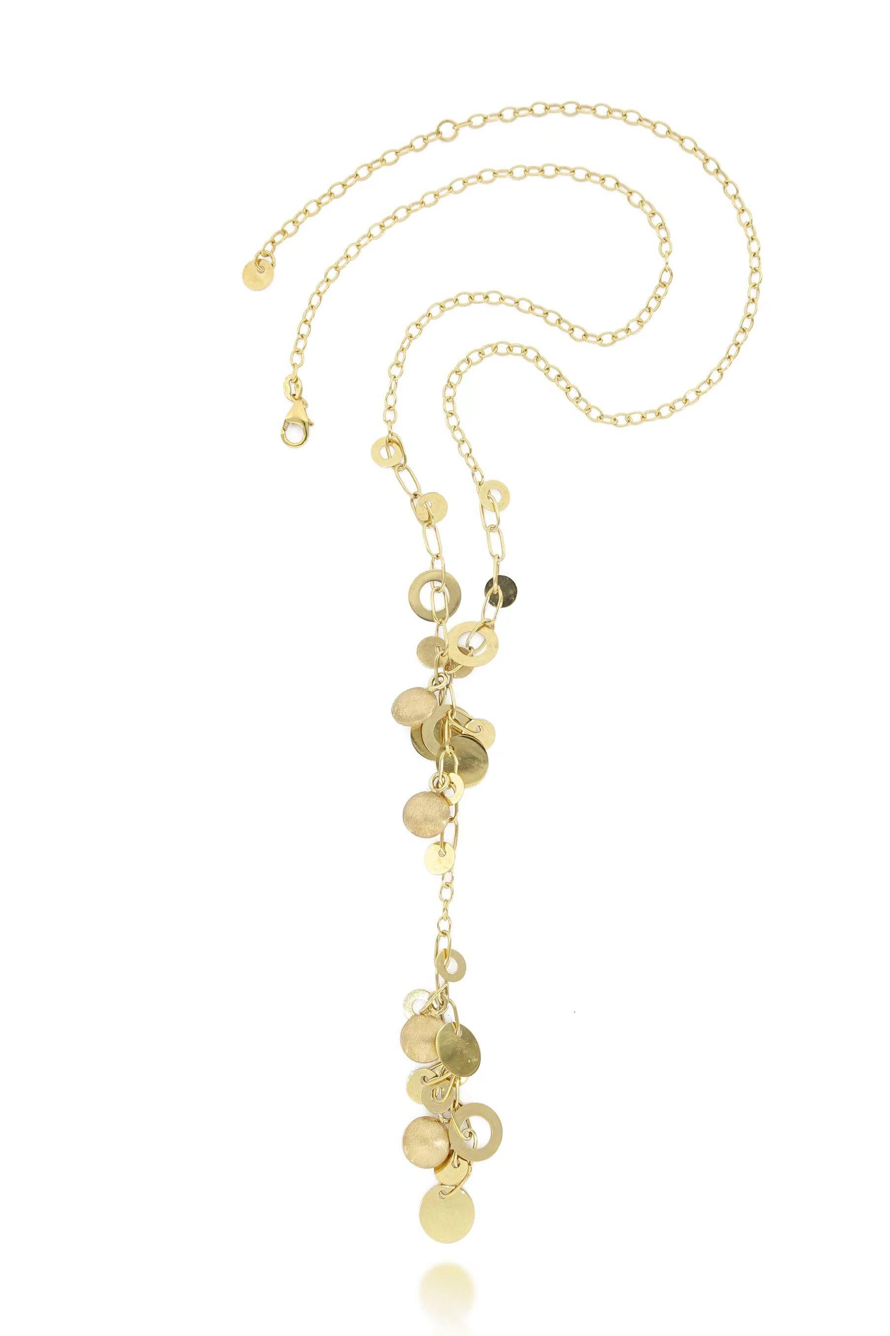 A very nice piece of necklace, designed and made in Italy, decorated with numerous dangling shinny and brushed pieces in 18 karat yellow gold, stylish and trendy.
The company was founded one and a half centuries ago in Macau. The brand is renowned