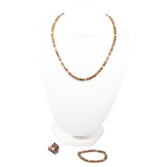 18K yellow gold necklace, ring and bracelet with semi-precious stones