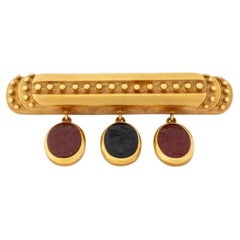 Épingle à barrette en or jaune 18K avec intaille en onyx et cornaline