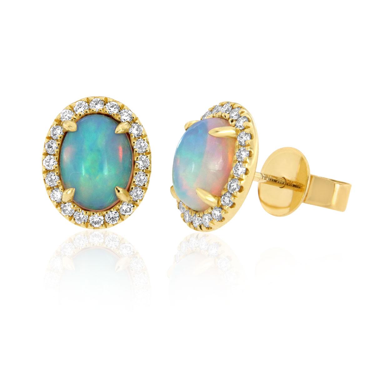 These colorful opal and diamond earrings feature two perfectly matched Oval opal framed by Micro prong round brilliant diamonds in 18k yellow gold. Experience the Difference!

Product details: 

Center Gemstone Type: Opal
Center Gemstone Carat