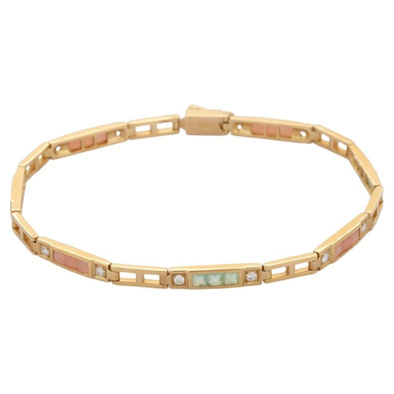 This Modern Opal Diamond Tennis Bracelet in 18K gold showcases 21 endlessly sparkling natural opal, weighing 1.6 carats and 14 pieces of diamonds weighing 0.36 carat. It measures 7 inches long in length. 
Emerald enhances the intellectual capacity
