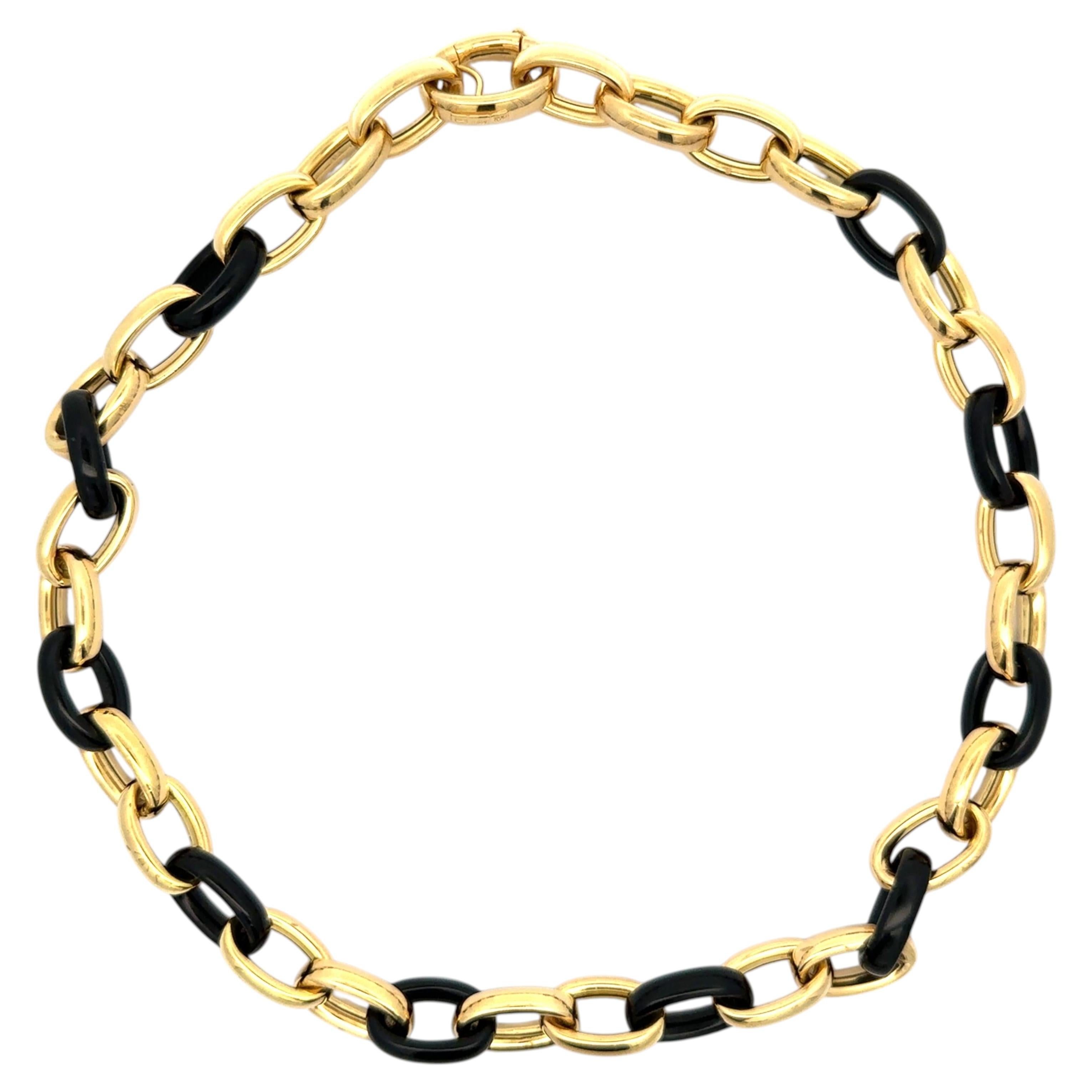 Collana con catena a maglie ovali aperte in oro giallo 18 carati, con maglie modellate in onice nero