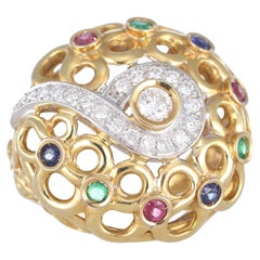 Anello traforato in oro giallo 18k con diamanti, zaffiri, rubini e smeraldi