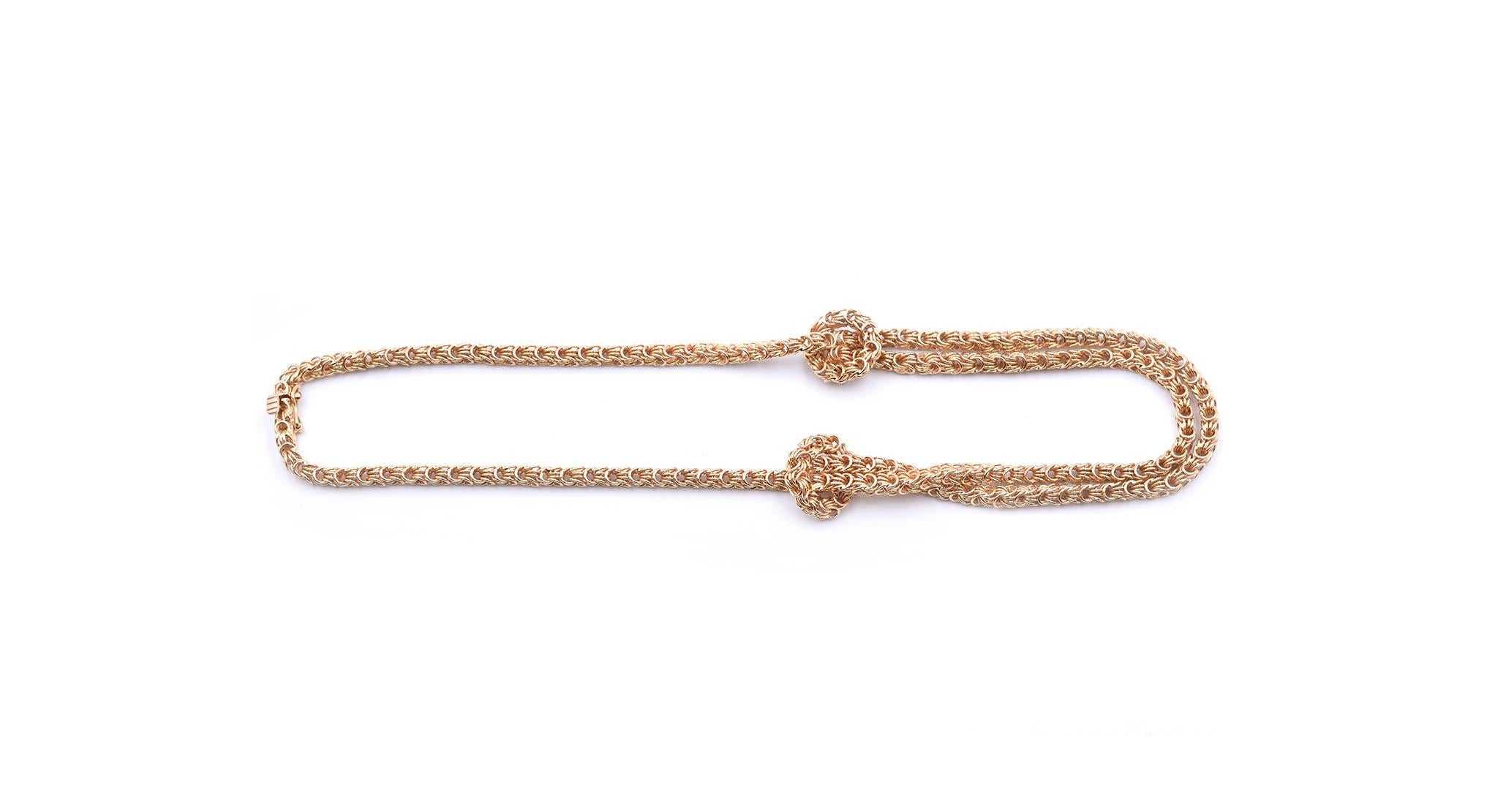 Designer: custom designed
Material: 14k yellow gold
Dimensions: necklace is 16-inches long and 3.75mm wide
Weight: 45.6 grams
