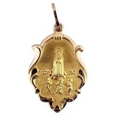 Ciondolo religioso della Madonna di Fatima in oro giallo 18 carati #24920