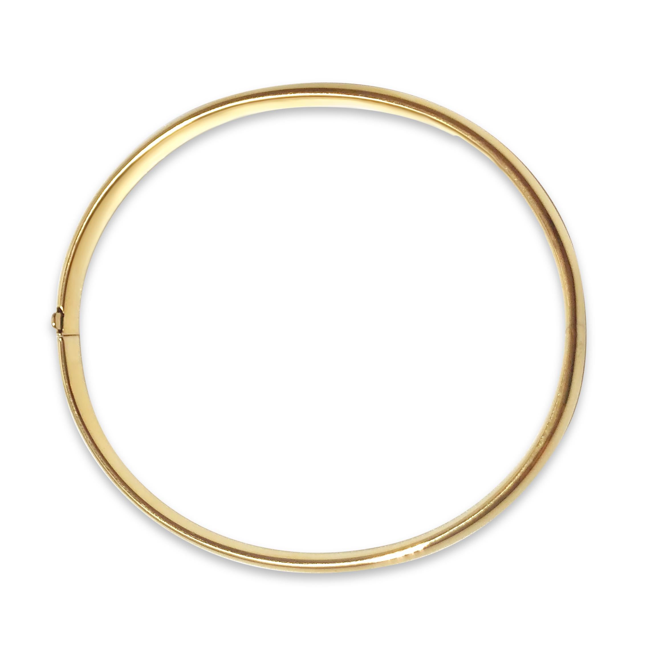 A perfectly classic gold bangle. Our ‘Dome Bright’ 18K yellow gold oval-shaped bracelet is 3/16 inches in width and securely closes with a snap & hinge.

Specifications:
- Shape: Oval
- Dimension: 6 5/8