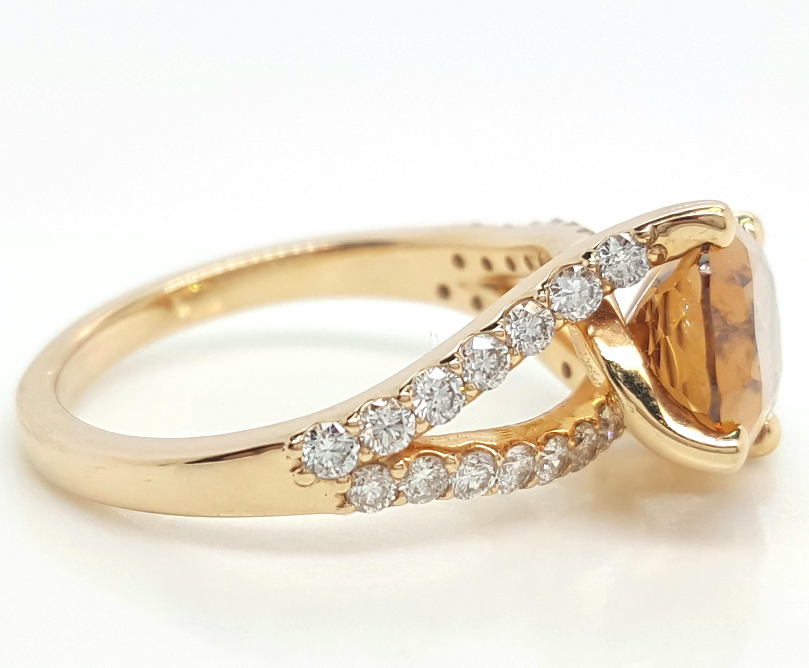 18K Yellow Gold Oval Zircon and Diamond Split Shank Ring.   This romantic ring is crafted with a split shank and trellis prongs holding a vibrant oval citrine weighing approximately 1.89 carats,  The split shank trellis is enhanced by 28 pave set