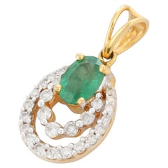 18K Yellow Gold Oval Cut Emerald and Diamond Pendant Necklace