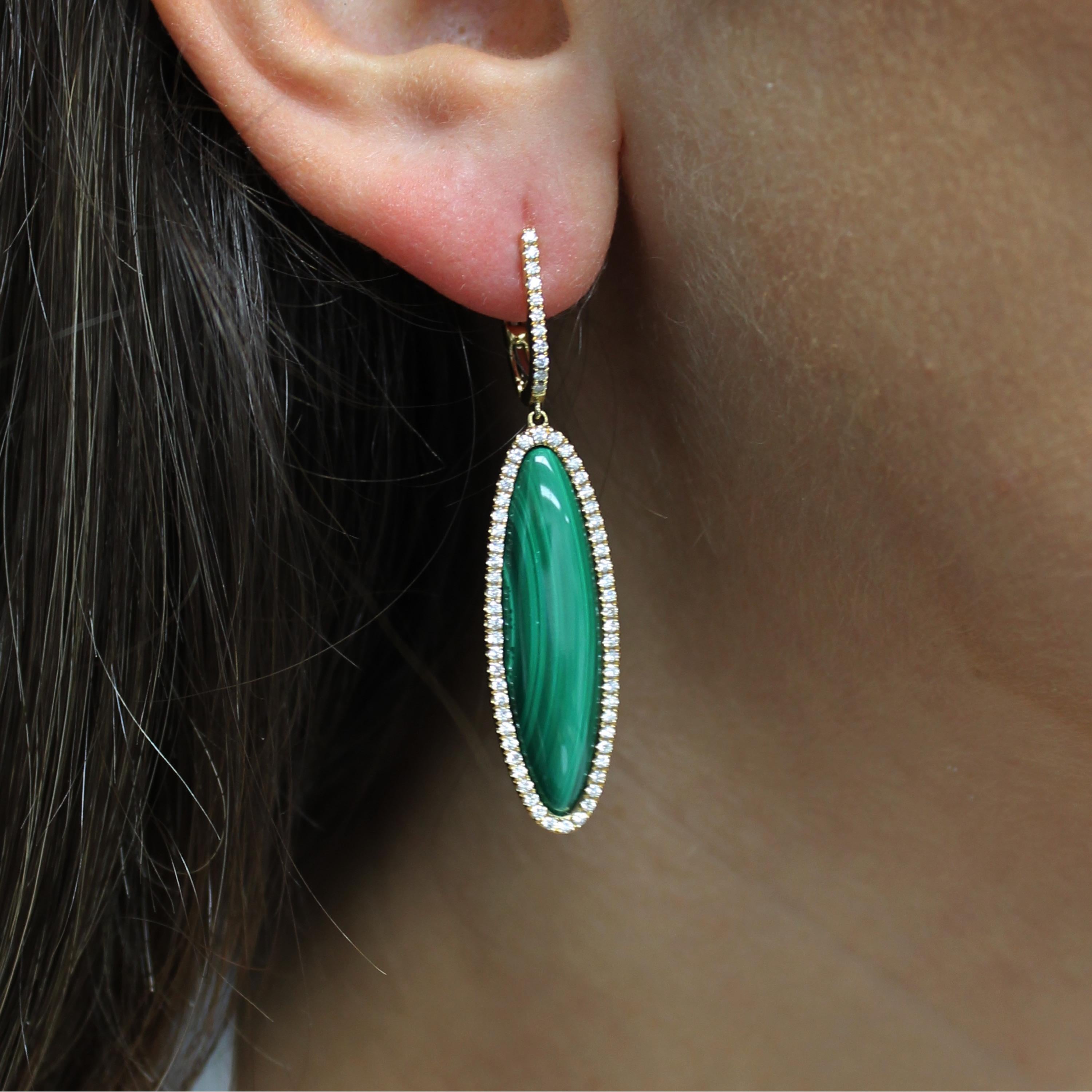 Verde Collection Earrings, with Long Oval Cabochon-cut Malachite, a halo of diamonds, and gold diamond huggie-tops, in 18K yellow gold. Malachite is stone of balance and abundance, and often called 