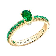 Fabergé 18k Yellow Gold Oval Emerald Fluted Ring with Tsavorite Shoulders