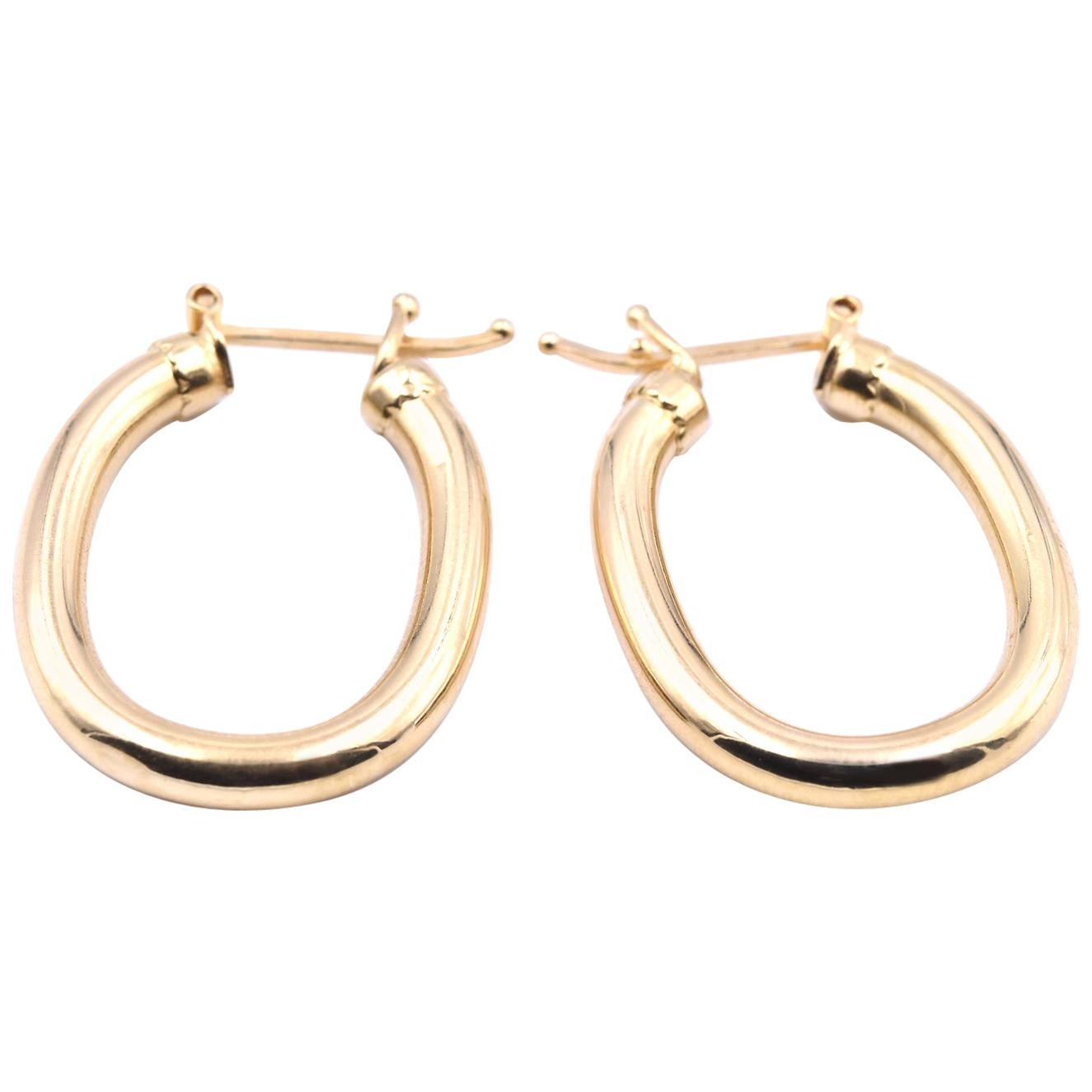 18 Karat Yellow Gold Oval Hoop Earrings