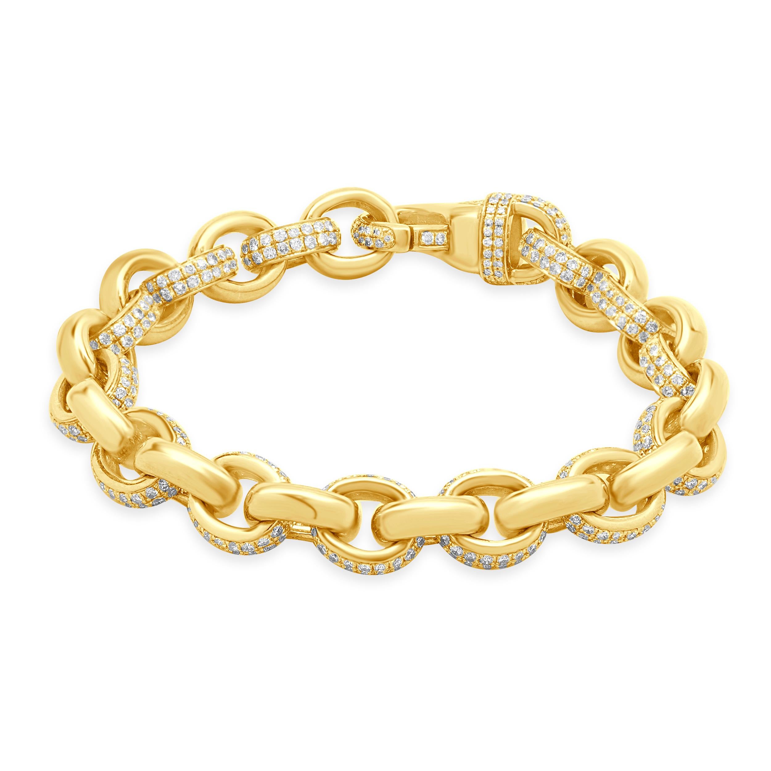 Designer: custom design
Material: 18K yellow Gold
Diamond: 661 round brilliant cut= 5.35cttw
Color: G
Clarity: VS
Dimensions: bracelet will fit up to a 7-inch wrist
Weight: 33.26 grams
