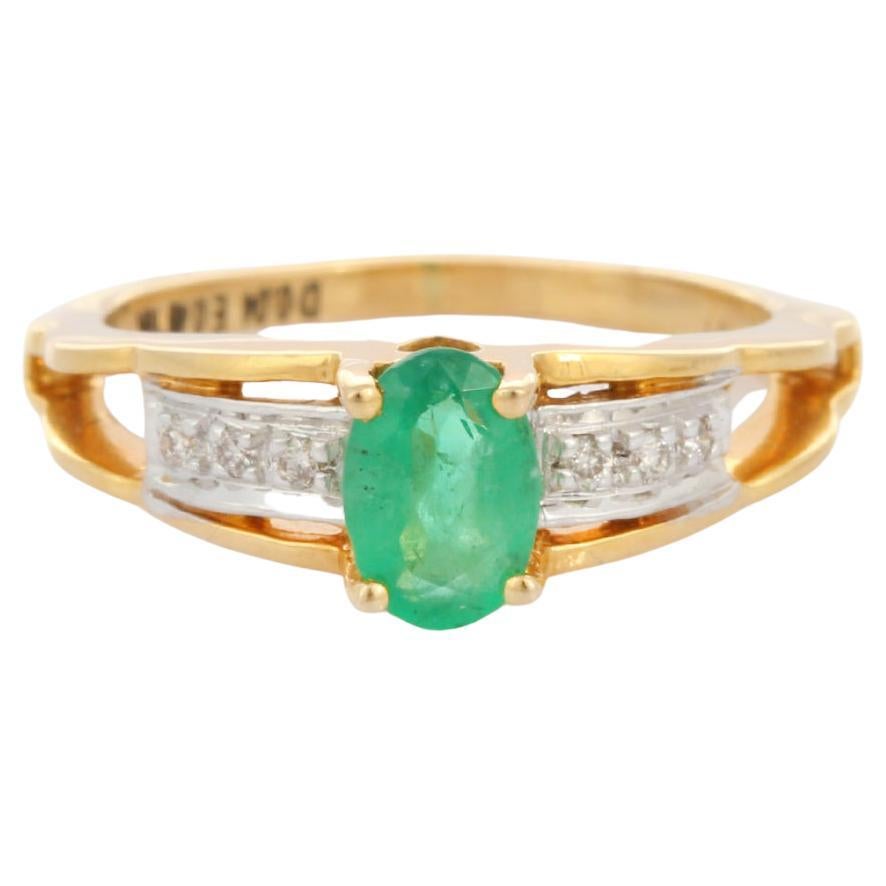 18K Yellow Gold Oval Shaped Emerald Ring with Diamonds