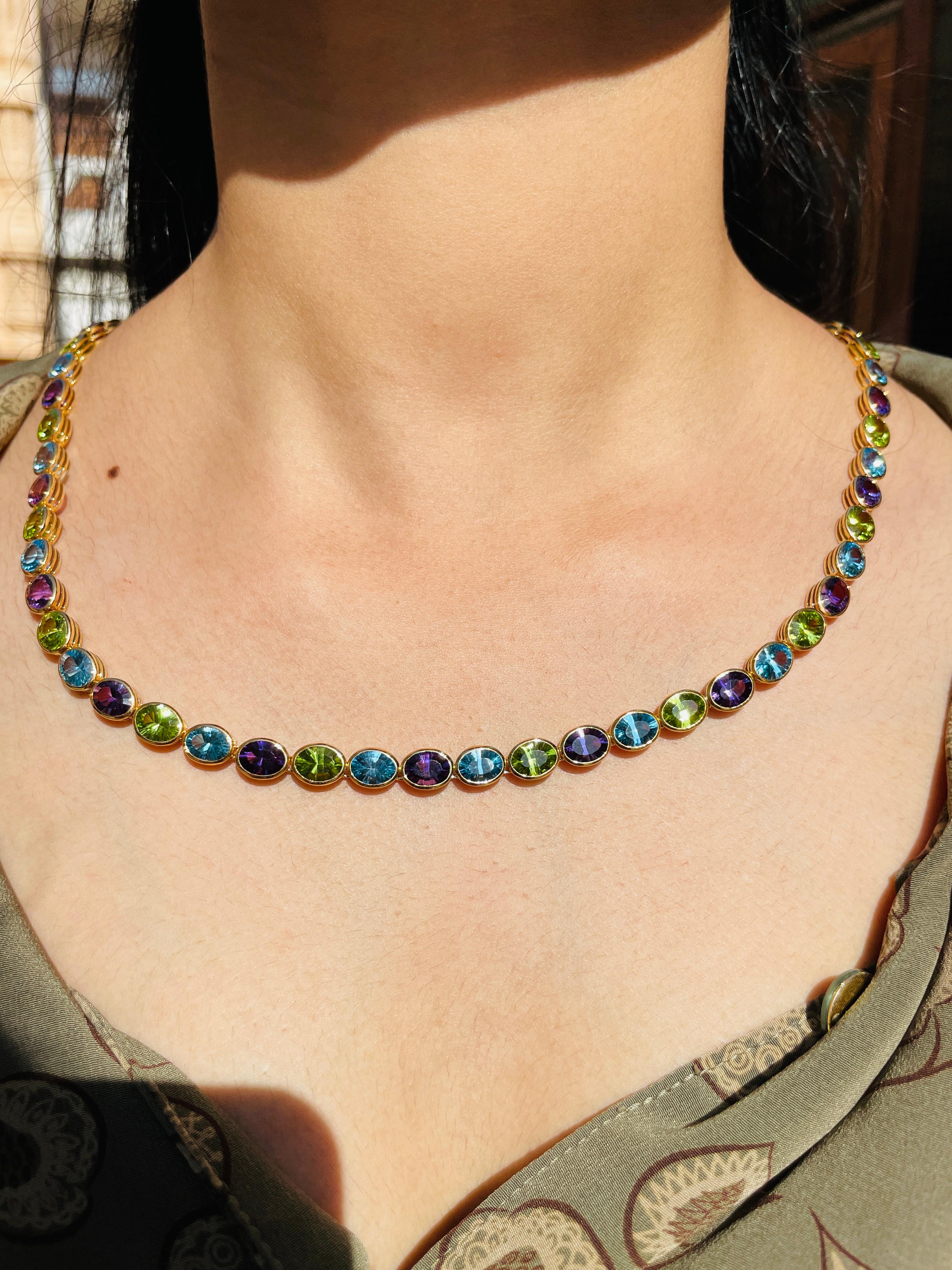 Multi Gemstone Necklace in 18K Gold studded with oval gemstone pieces.
Accessorize your look with this elegant multi gemstone beaded necklace. This stunning piece of jewelry instantly elevates a casual look or dressy outfit. Comfortable and easy to