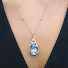18K Gold Oval Sky Blue Topaz Necklace with Baguette Diamonds and Diamond Chain