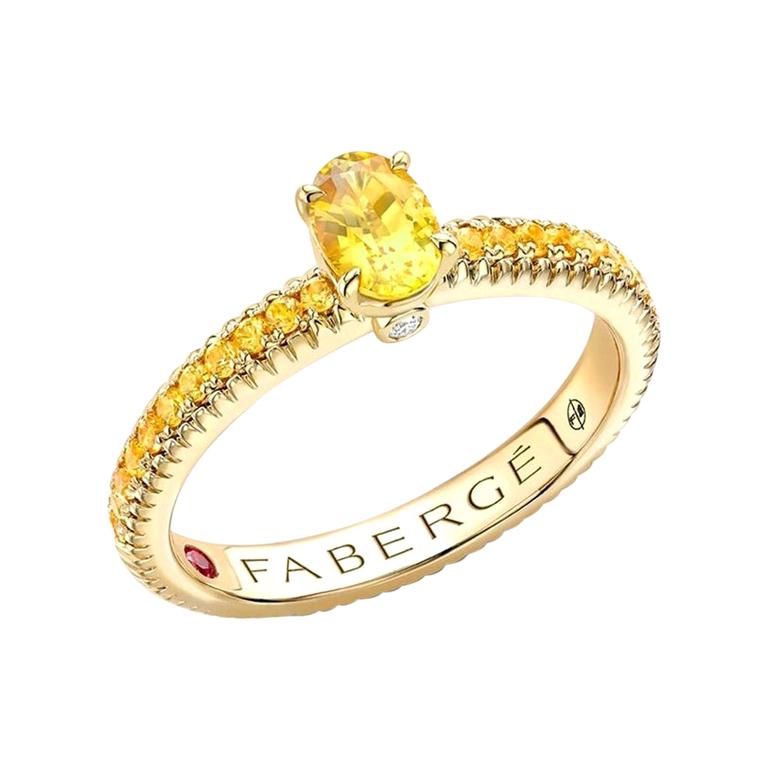 For Sale:  Fabergé 18k Yellow Gold Oval Yellow Sapphire Fluted Ring with Sapphire Shoulders