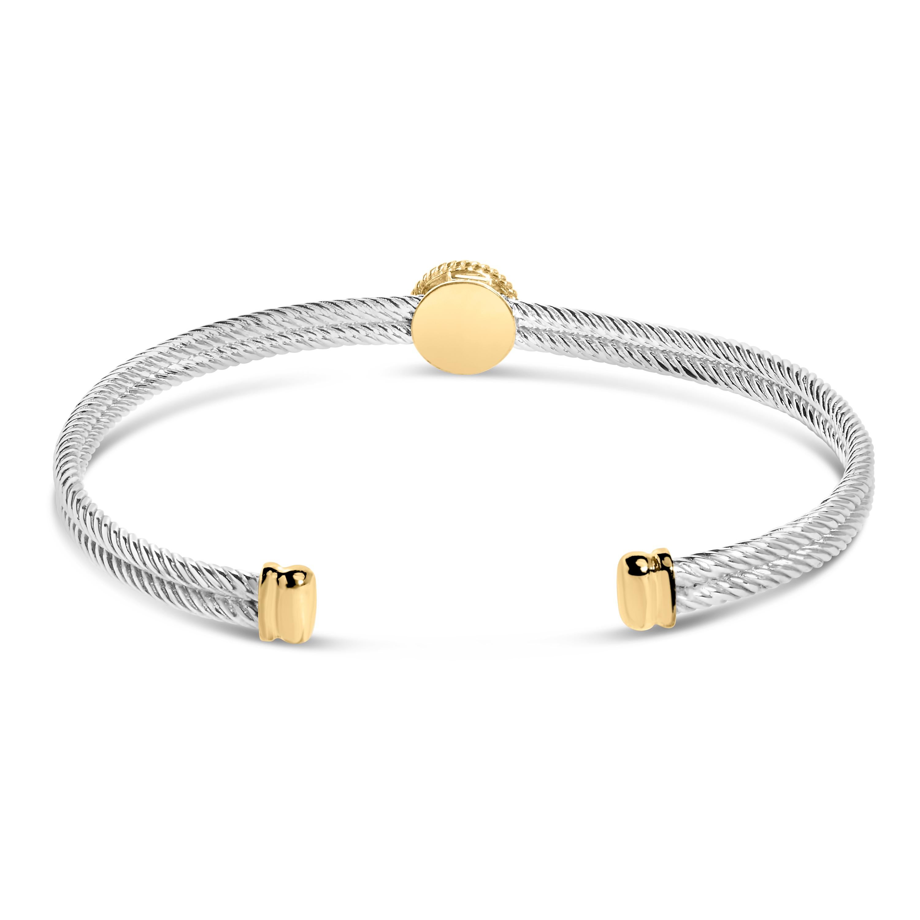 Indulge in timeless elegance with our 18K Yellow Gold Plated .925 Sterling Silver Diamond Accent and Fleur Di Lis Medallion Bangle Bracelet. Crafted with exquisite attention to detail, this bracelet features 9 natural round accent diamonds totaling