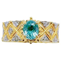 Anello con tormalina Paraiba in oro giallo 18 carati e diamanti