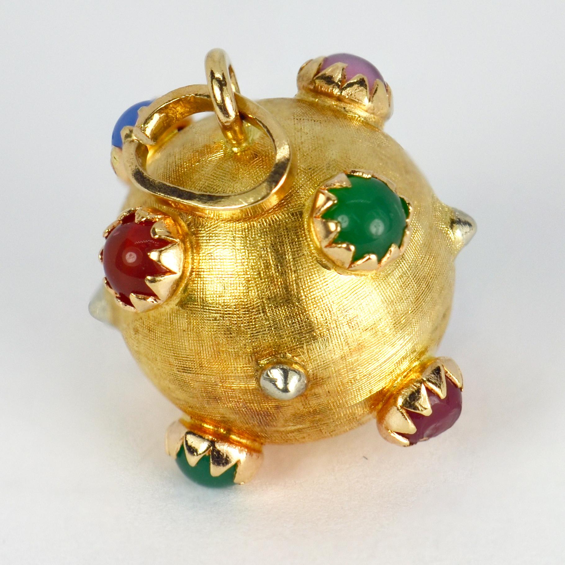 An 18 karat (18K) yellow gold charm pendant designed as a sputnik sphere set with multi-coloured paste gems. Stamped K18 for 18 karat gold.

Dimensions: 2.2 x 2.2 x 2.2 cm (not including jump ring)
Weight: 5.24 grams
