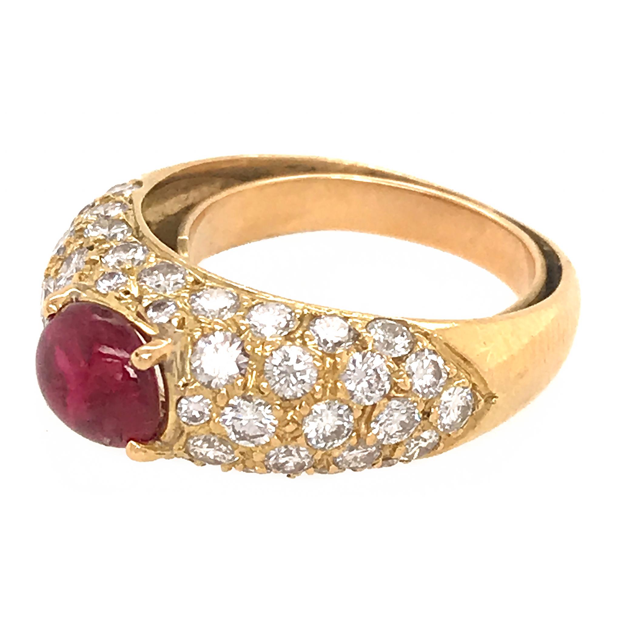 18k Yellow Gold
Diamond: 2.50 ct twd 
Color: G
Clarity: VS 
Ruby: 0.50 tcw