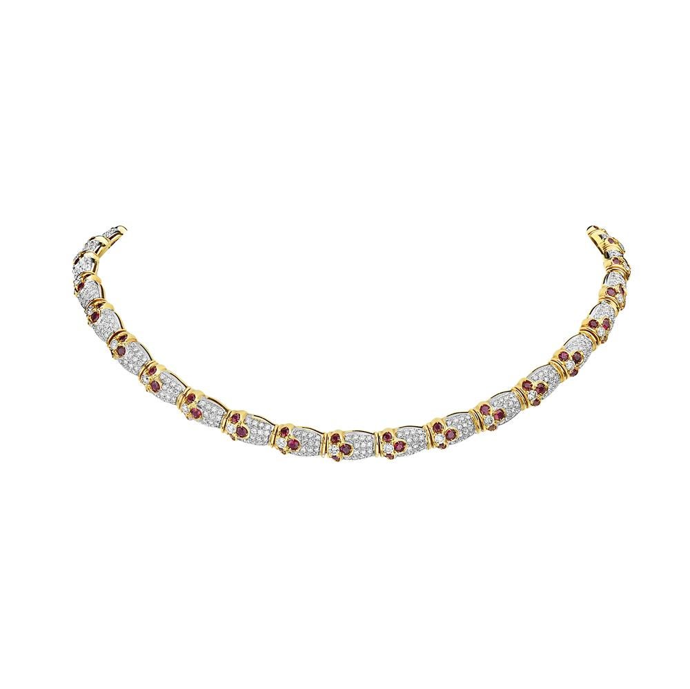 This choker features 8.11 carats of diamonds and 6.52 carats ruby set in 18K yellow gold. 63 grams total weight. 6 inch diameter. Made in Italy.

Viewings available in our NYC showroom by appointment. 