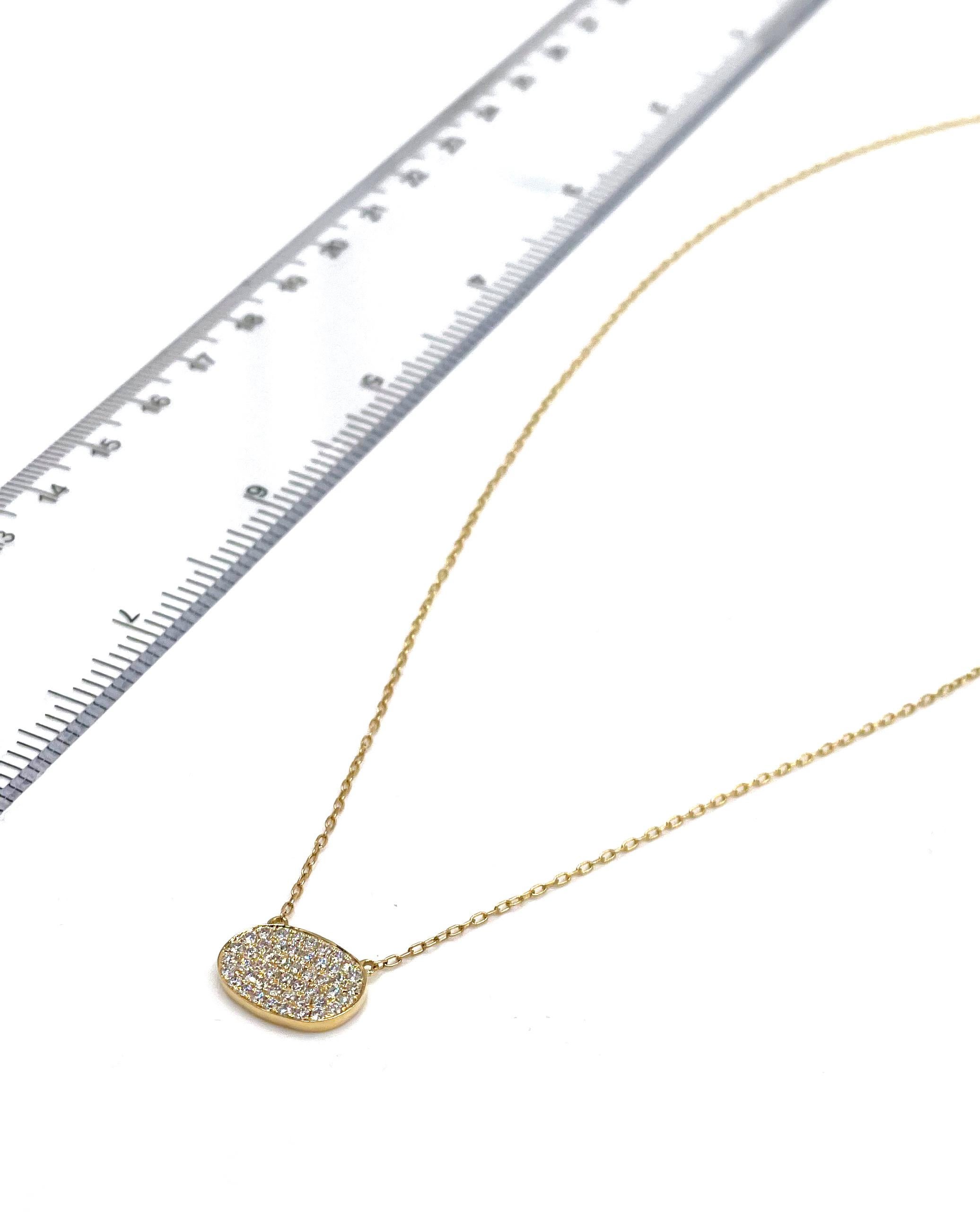 Round Cut Oval Pendant Necklace with Pavé Diamonds Set in 18K Yellow Gold For Sale