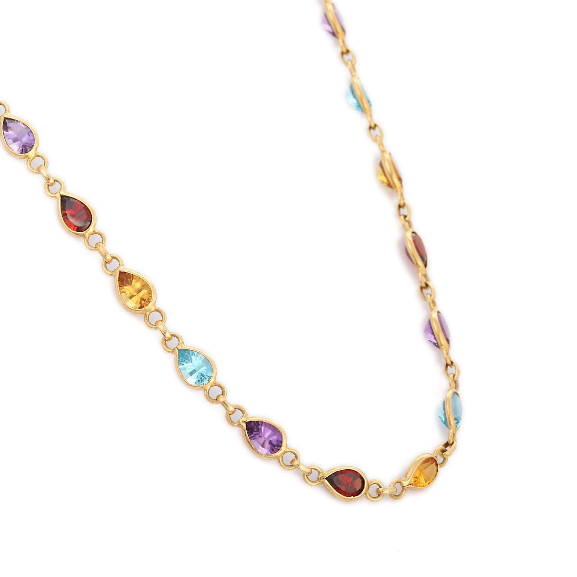 Multi Gemstone Necklace in 18K Gold studded with pear cut semi precious multi gemstone.
Accessorize your look with this elegant semi precious multi gemstone linked necklace. This stunning piece of jewelry instantly elevates a casual look or dressy