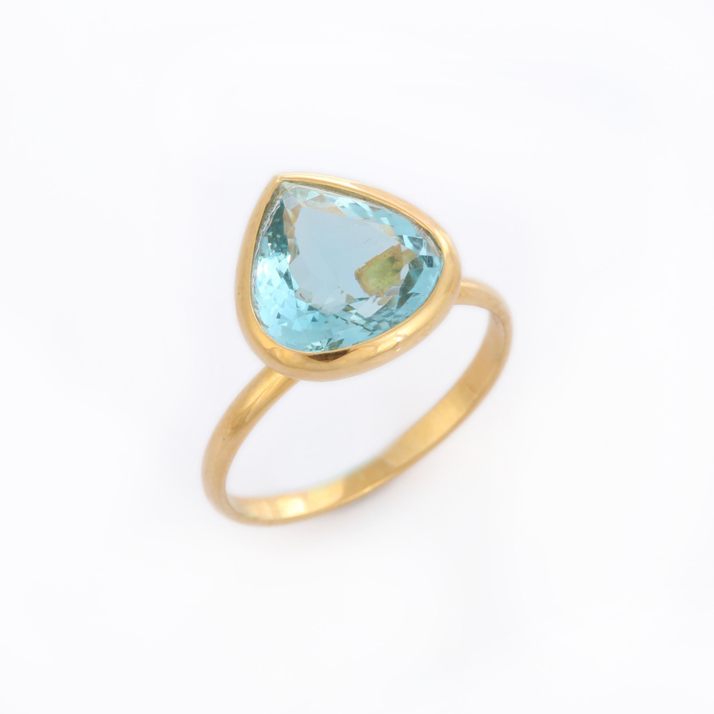 For Sale:  18K Yellow Gold Pear Cut Aquamarine Solitaire Ring 9