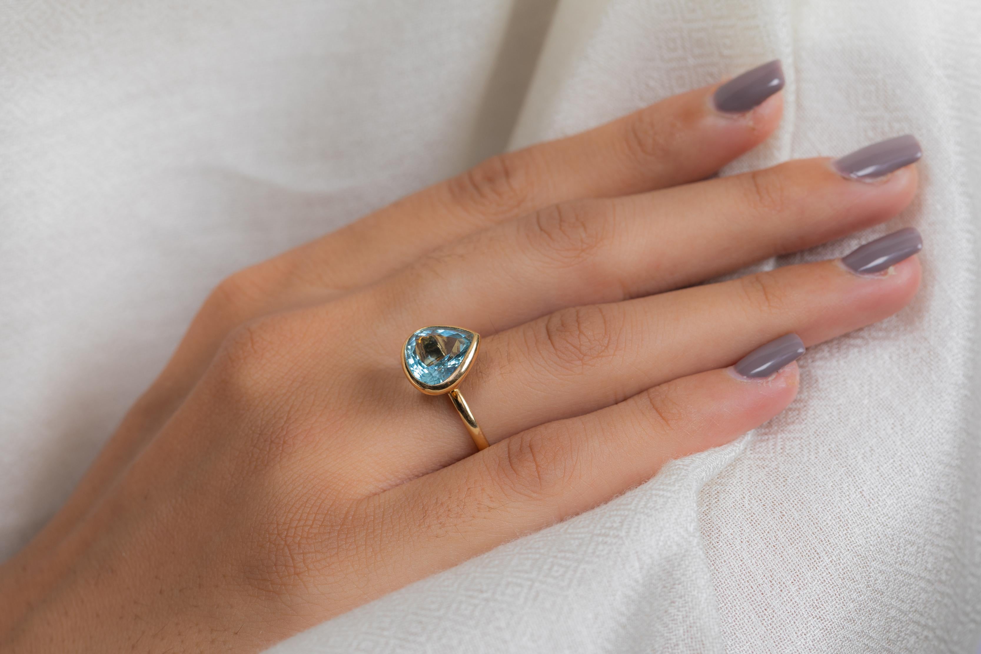 For Sale:  18K Yellow Gold Pear Cut Aquamarine Solitaire Ring 10