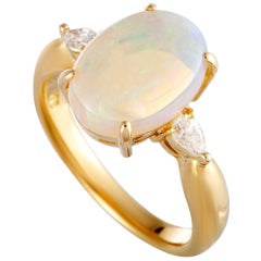 18 Karat Yellow Gold Pear Diamond and Opal Oval Ring