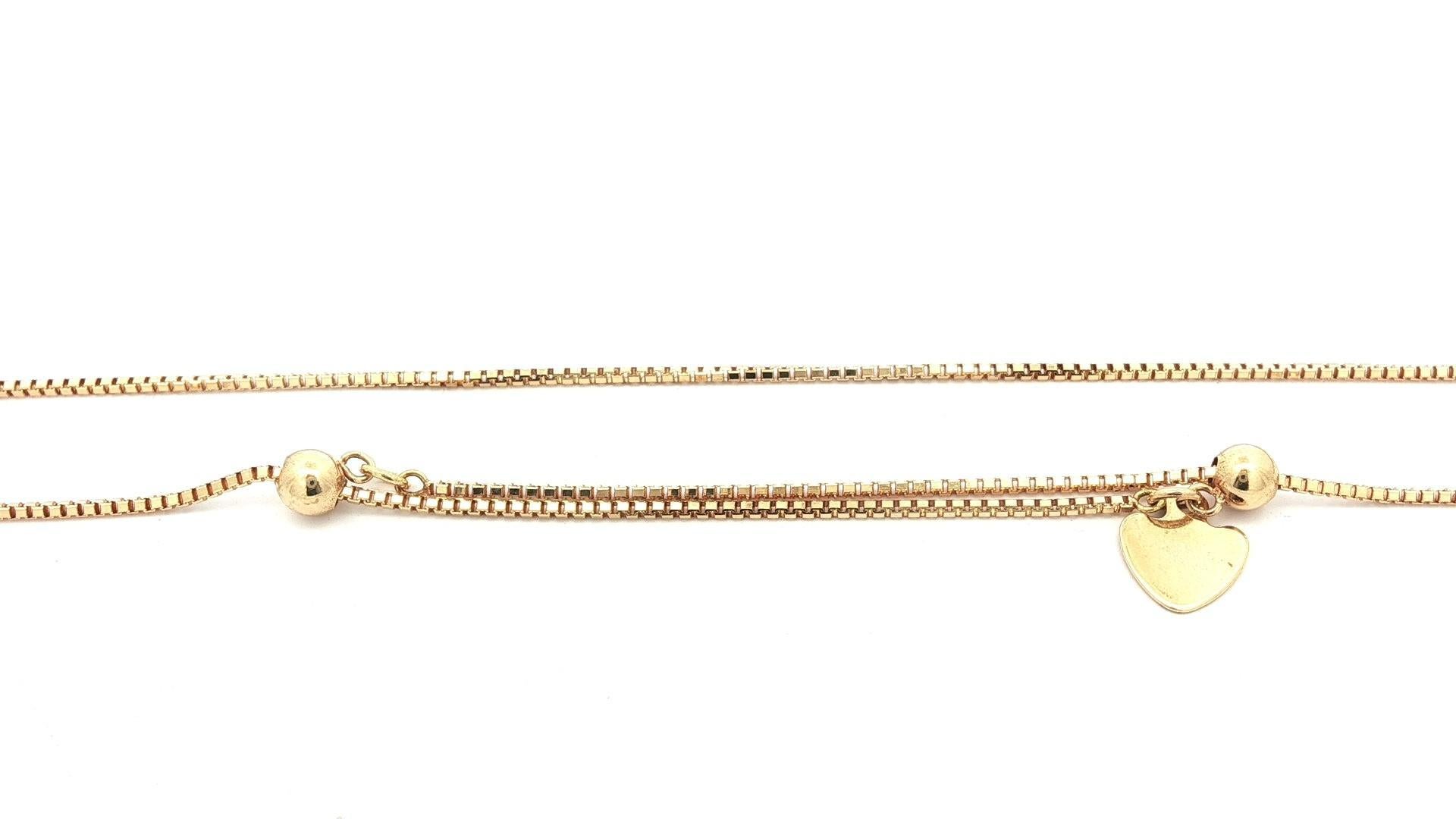 Ciondolo a goccia con diamante e pera in oro giallo 18 carati, con catena regolabile In condizioni buone in vendita a Montclair, NJ