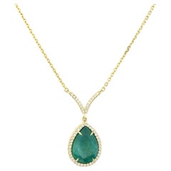 18k Yellow Gold Pear Shape Emerald Center with Diamond Halo Necklace