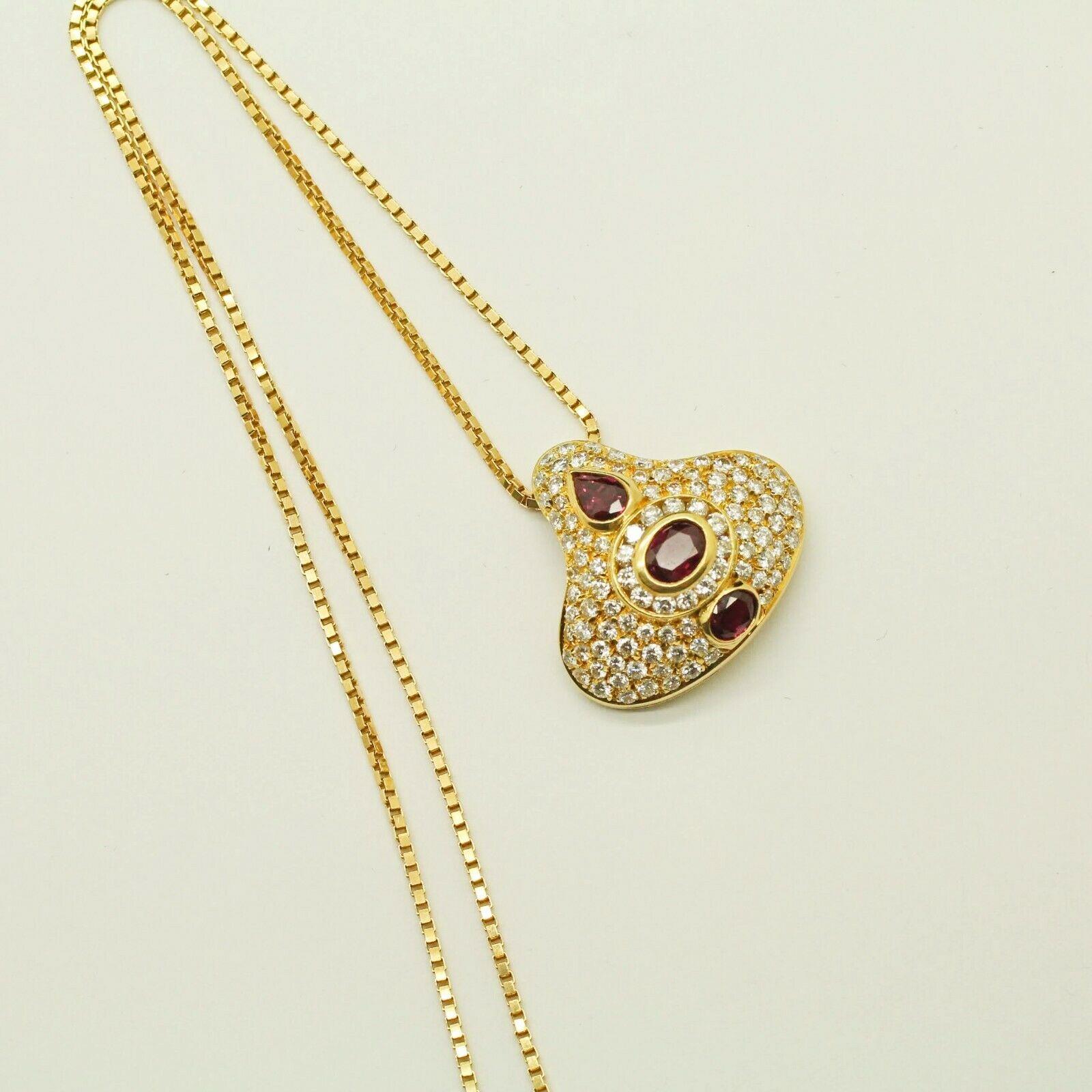 18 Karat Yellow Gold Pear-Shaped and Oval Ruby and Diamond Pendant In New Condition In Los Angeles, CA