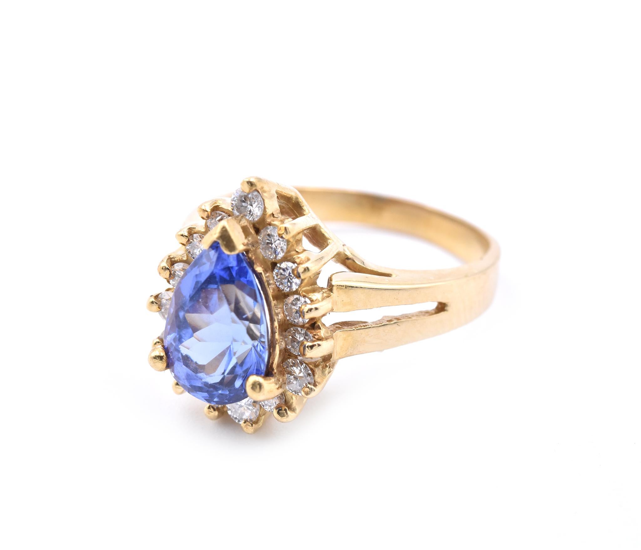 Round Cut 18 Karat Yellow Gold Pear Tanzanite and Diamond Ring