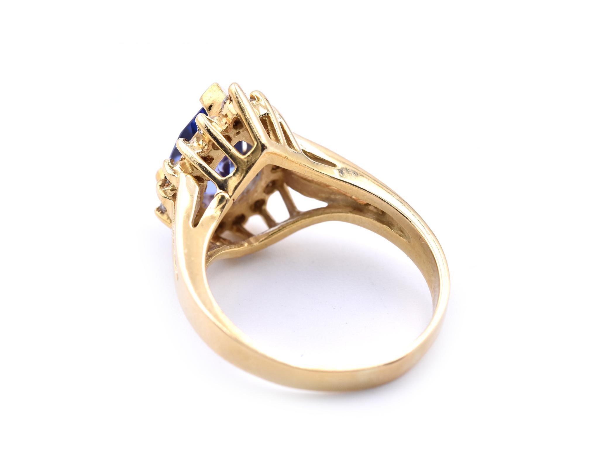 18 Karat Yellow Gold Pear Tanzanite and Diamond Ring In Excellent Condition In Scottsdale, AZ