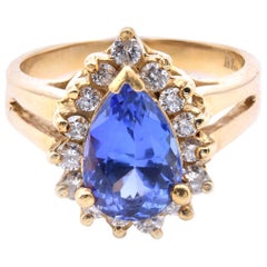 18 Karat Yellow Gold Pear Tanzanite and Diamond Ring